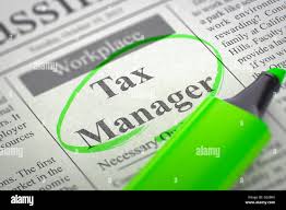 Finance & Tax Manager Jobs newspaper ad highlighted with green marker.